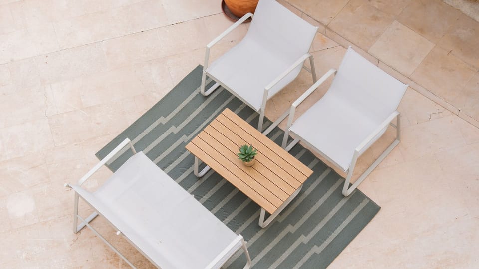 Enjoy tranquil outdoor moments on this chic patio, perfect for morning coffee or evening conversations under the open sky.
#OutdoorSeating #PatioLife #LovelyStay