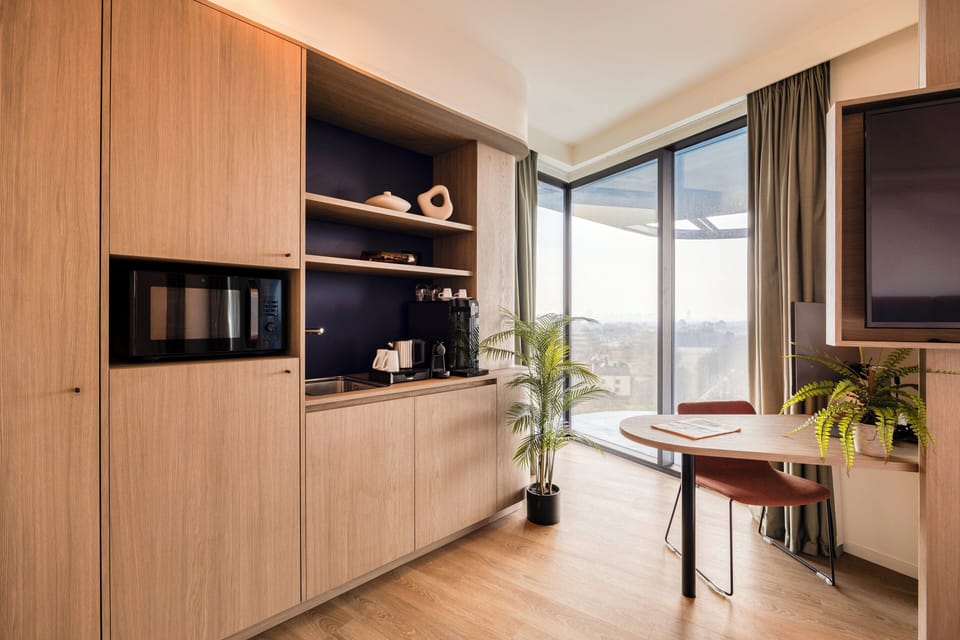 Grand Room, 1 King Bed, Balcony | Minibar, in-room safe, desk, soundproofing