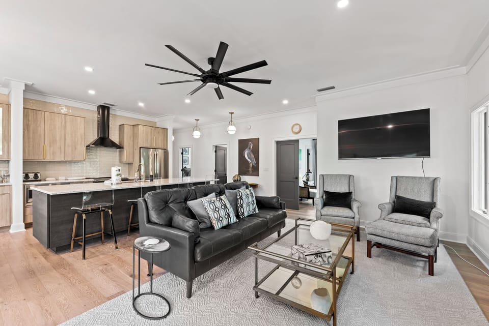The living, dining and kitchen open on to each other