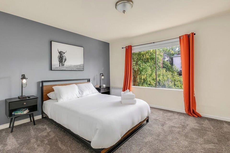 Cozy and modern queen bed.