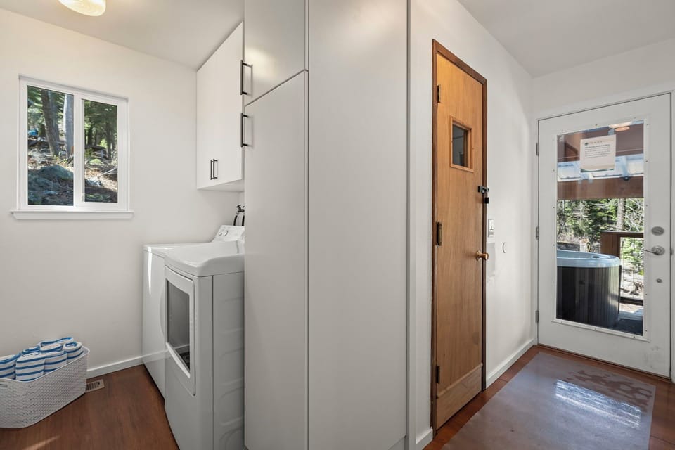Your private laundry area keeps you organized with modern appliances and abundant storage space.
