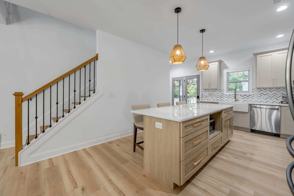 This beautifully designed kitchen features durable countertops, full-size appliances, and everything you need to cook, serve, and enjoy meals at home.