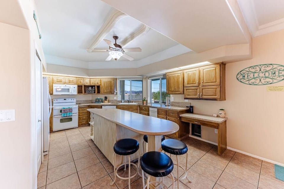 Open-concept kitchen with island seating.