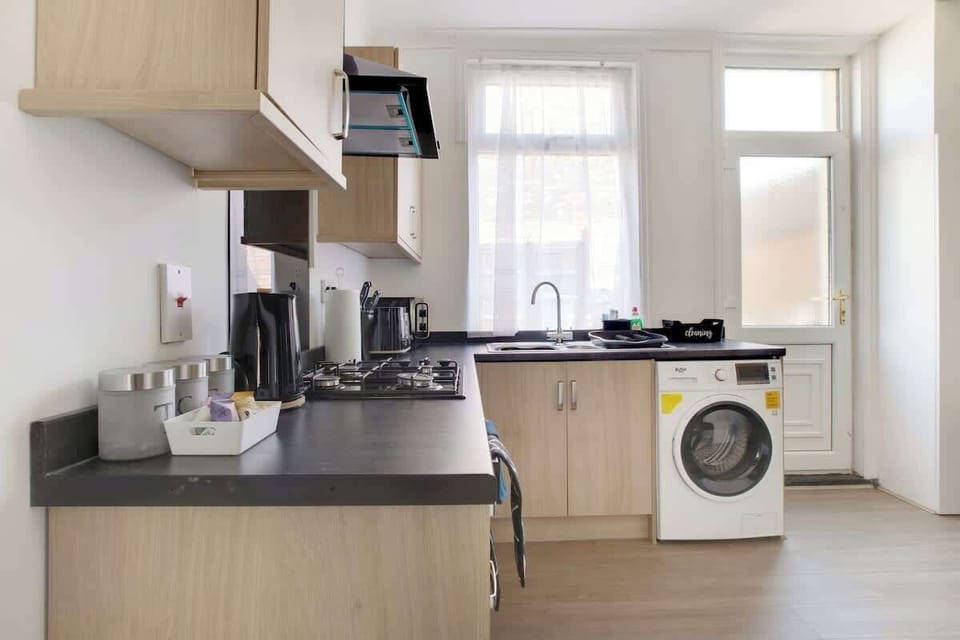 Fully equipped kitchen with everything you need to prepare meals during your stay.