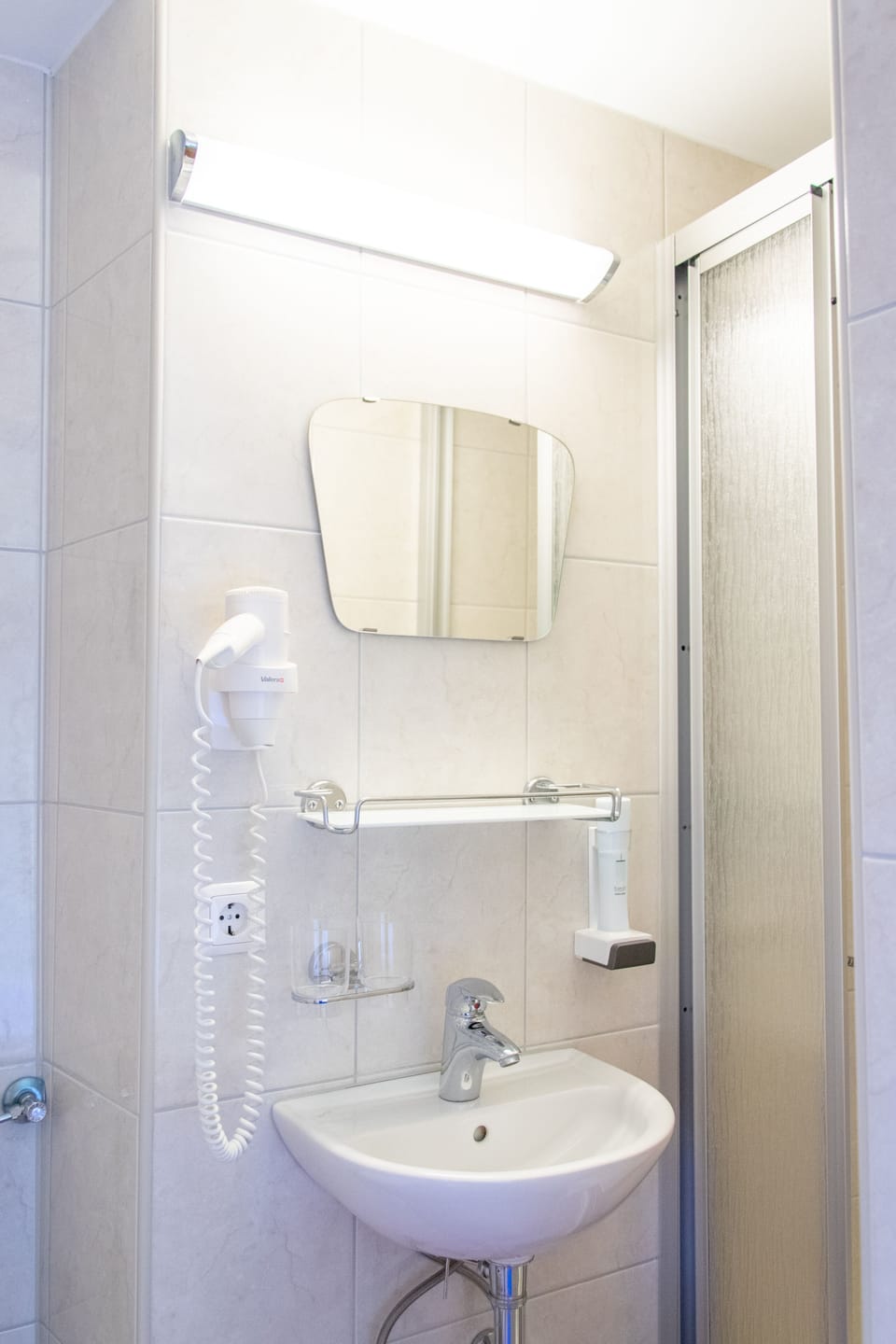 Hair dryer, bathrobes, towels, soap