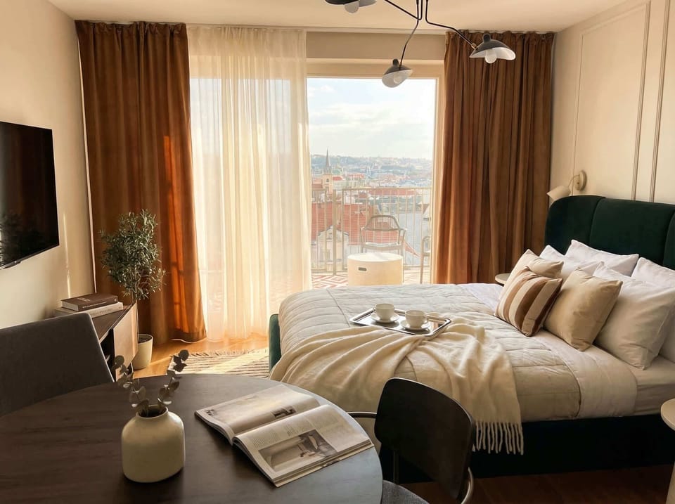 Gorgeous apartment with stunning view. This is second bedroom with queen size bed, access to the terrace and fully equipped kitchen