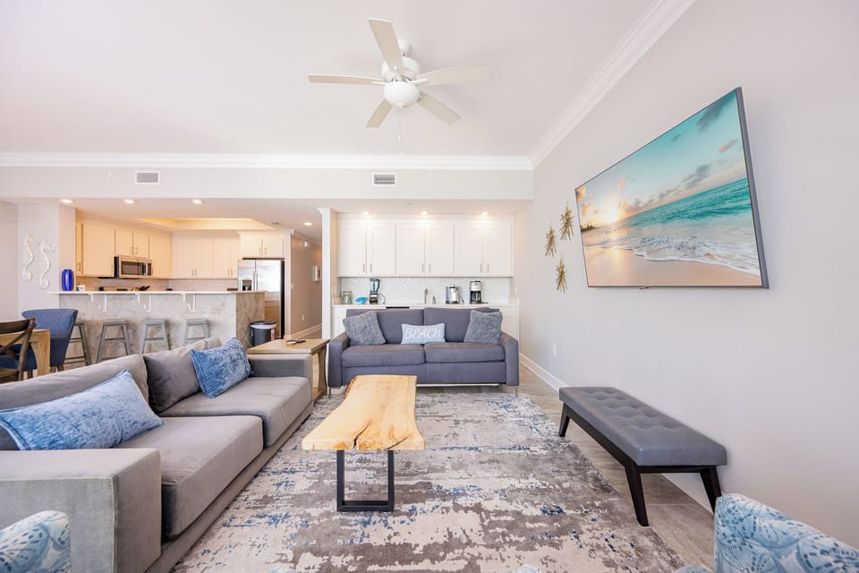 Sink into the plush sofa with queen sleeper, stream your favorite shows on the TV, and unwind in this living space