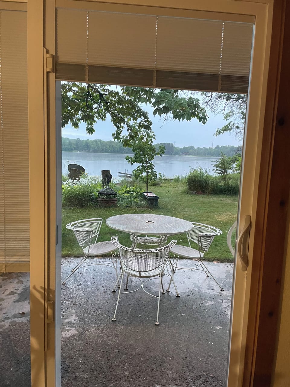 Patio and lake view from the sliding door.