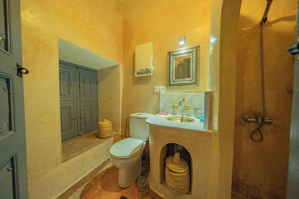 Shower, hair dryer, bathrobes, towels
