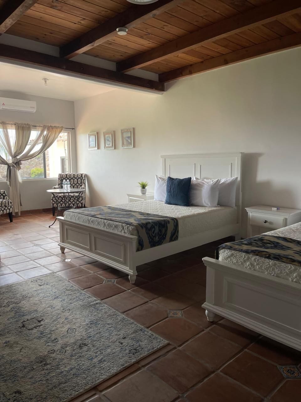 Family Double Room, Multiple Beds, Air conditioning, Mountain View | Down comforters, iron/ironing board, free WiFi, bed sheets