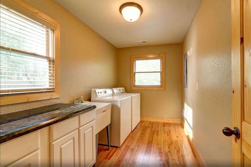 Keep your vacation essentials fresh with the convenience of an easily accessible laundry area.
