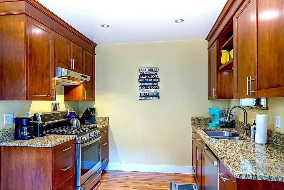 The kitchen with gas stove, refrigerator, Keurig with pods and drip coffee maker