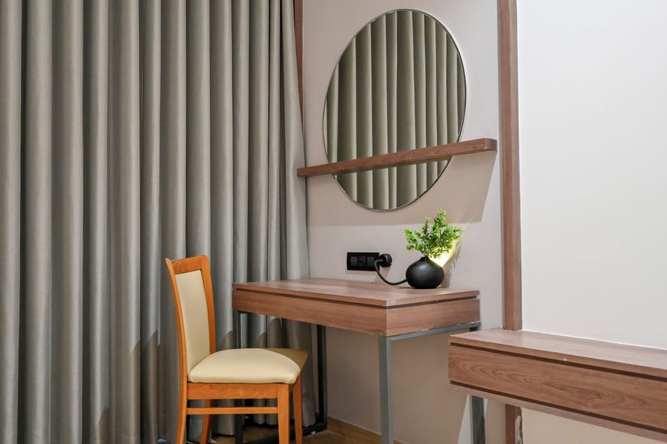 Cozy Room | Minibar, desk, laptop workspace, iron/ironing board