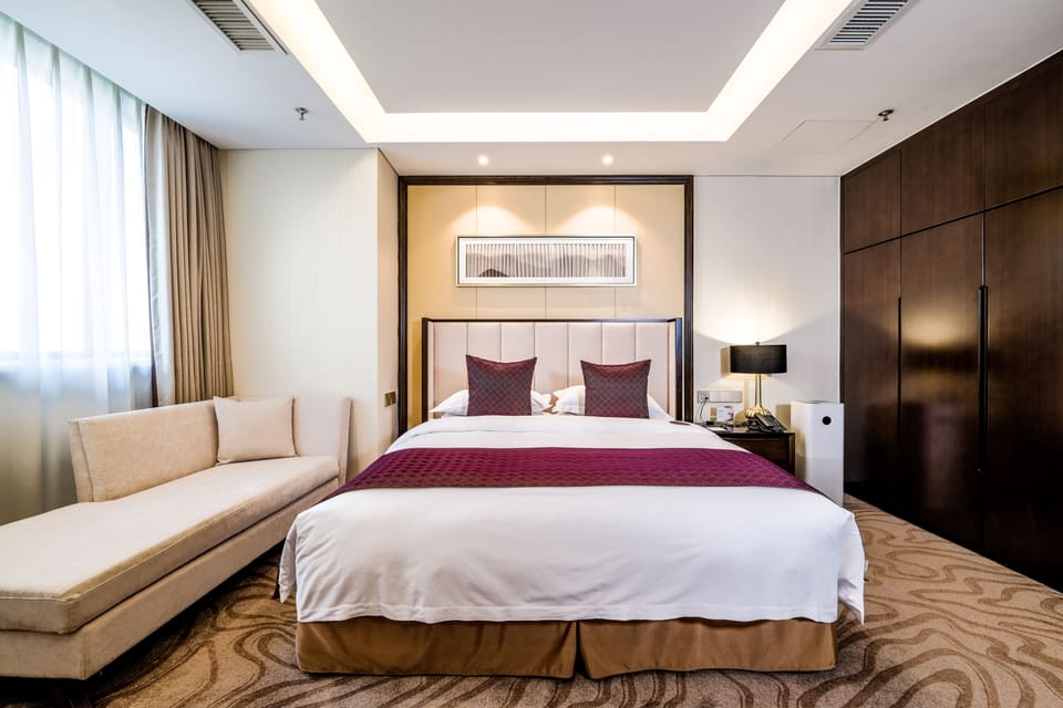 Standard Suite | Living area | 50-inch TV with cable channels