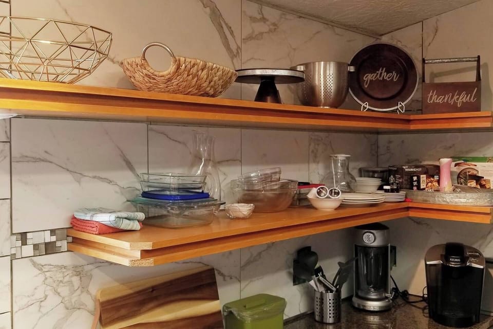 Marble like tile wall just completed in the kitchen. Photos will be updated once grout in is.