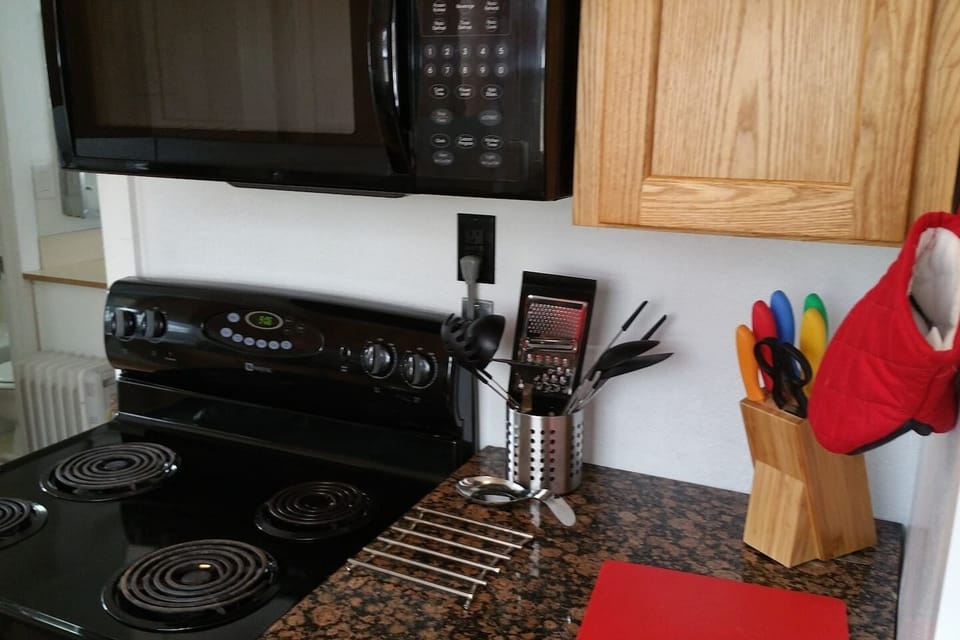 Fully Equipped kitchen includes Cookware & Bakeware + Dishes and Silverware. Microwave, wide mouth toaster and coffee machine just brought in for your convenience as well.
