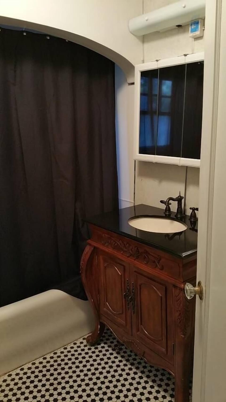 Vintage tile in the period style bathroom!