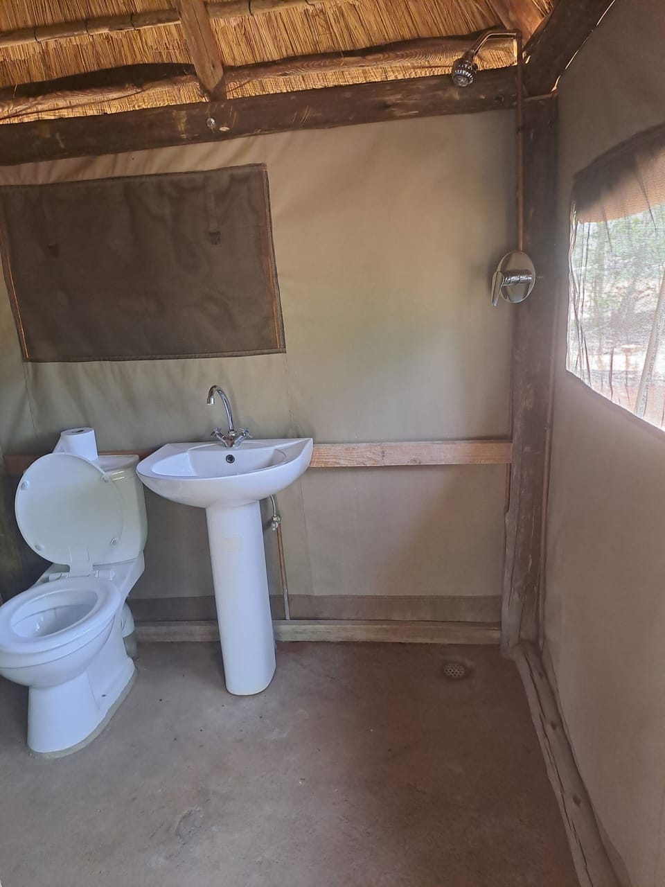 Luxury Tent, Courtyard View | Bathroom | Shower, rainfall showerhead, eco-friendly toiletries, towels
