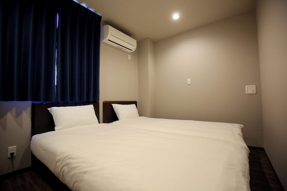 Desk, blackout drapes, free WiFi, bed sheets