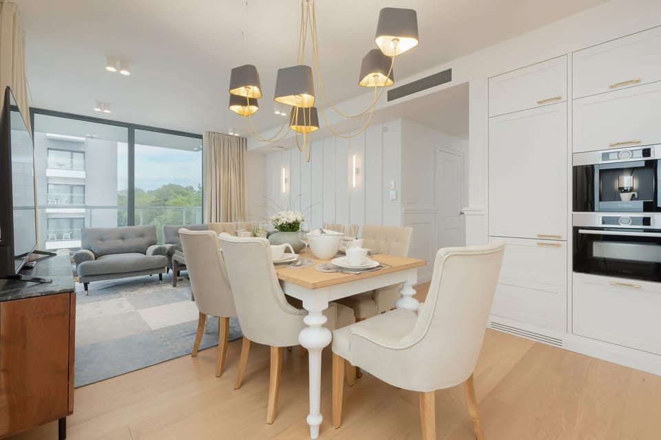 A spacious dining and living area, blending comfort and style with a warm, inviting atmosphere.

