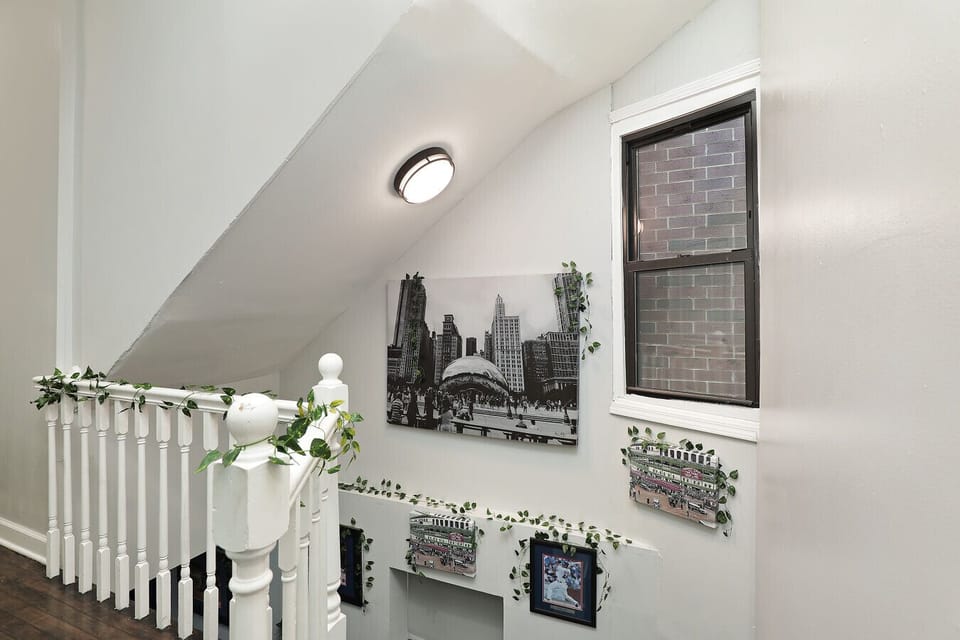 Connecting the home’s cozy spaces with a clean, welcoming staircase