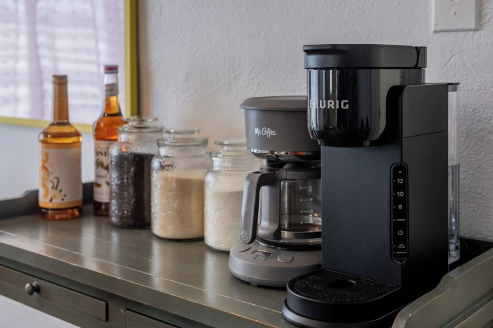 Coffee bar with Keurig, Drip Coffee Maker, Coffee, Cream, Sugar, and Syrups