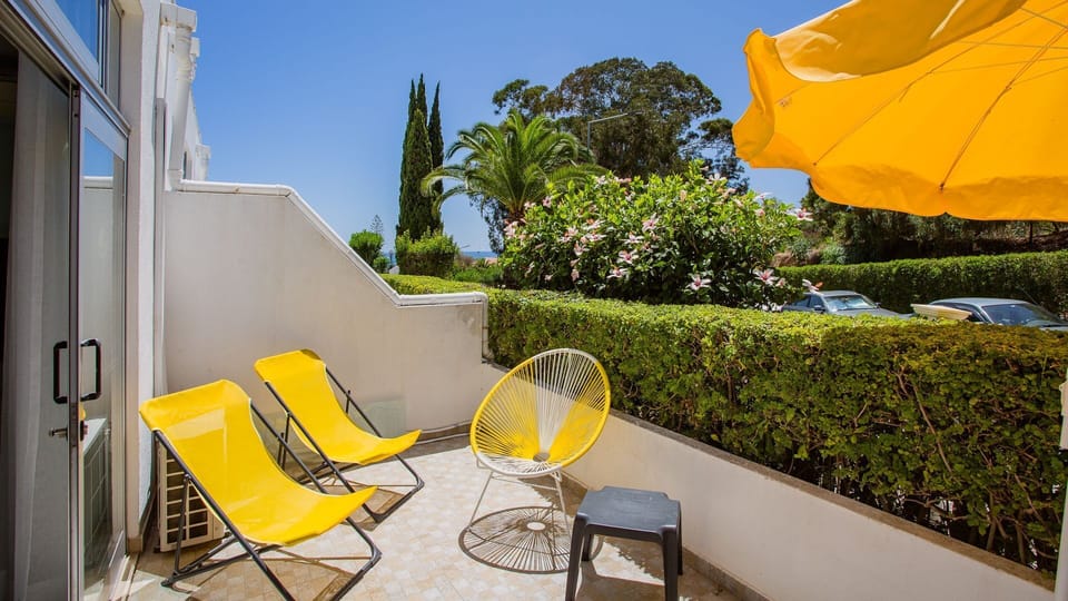 Enjoy spectacular aerial vistas of the sun-drenched coastal town, with its charming architecture sprawling towards the azure ocean.
#CityView #BeachView #LovelyStay