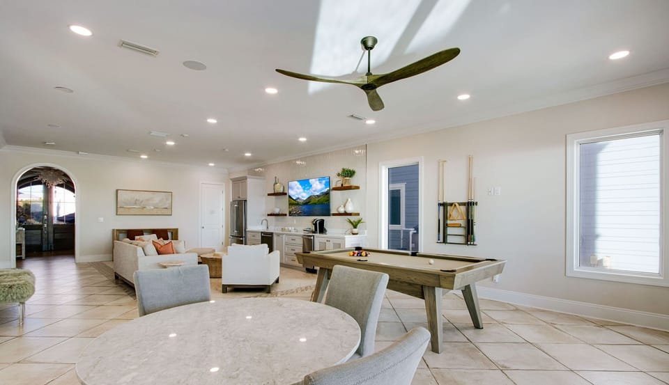 First Floor Living Room - Kitchen - Pool Table - Dining Area - Patio Access