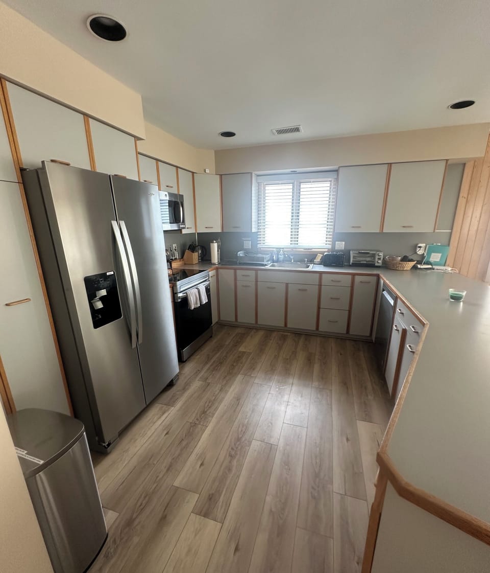 New stainless steel refrigerator added in April 2025 - stove April 2024