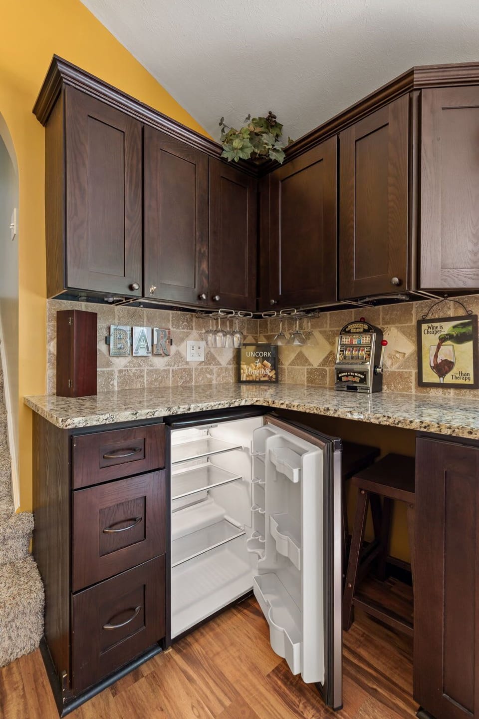 Dining area with wet bar and mini fridge