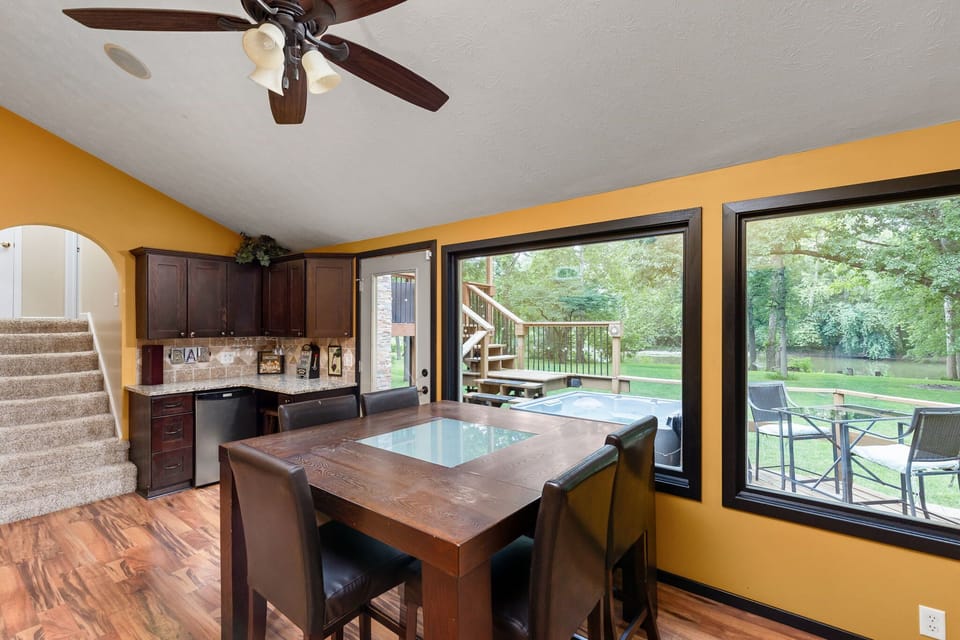 Dining area with wet bar and mini fridge