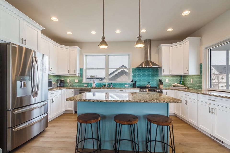 Stunning kitchen with granite counter tops and stainless appliances