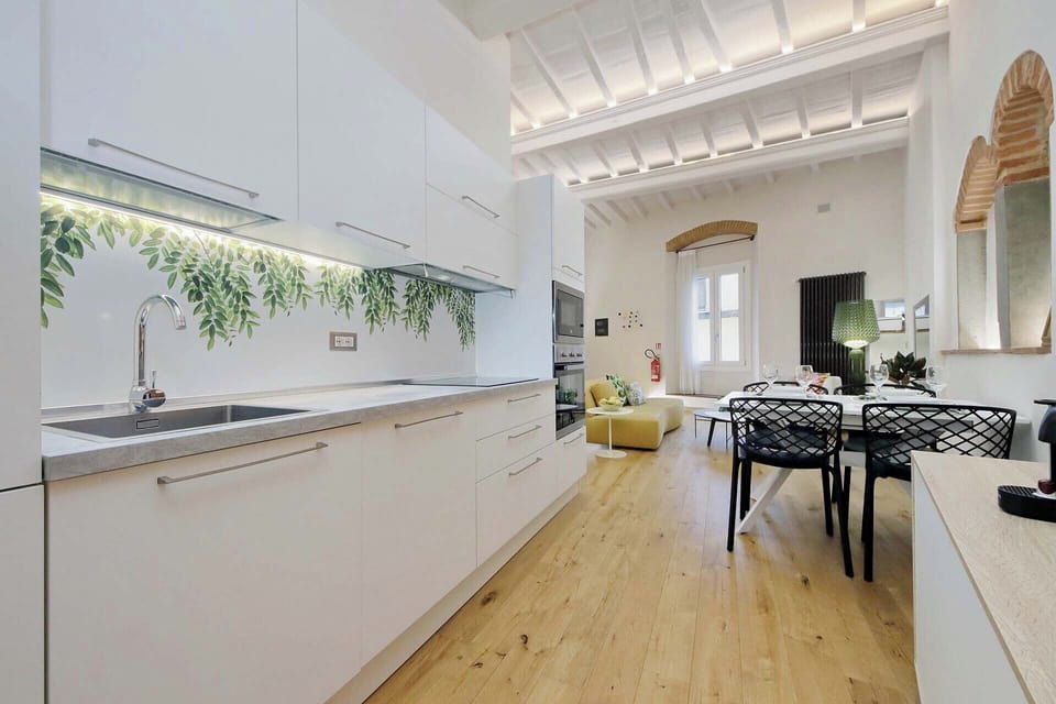 The kitchen opens up to the dining area and living room.