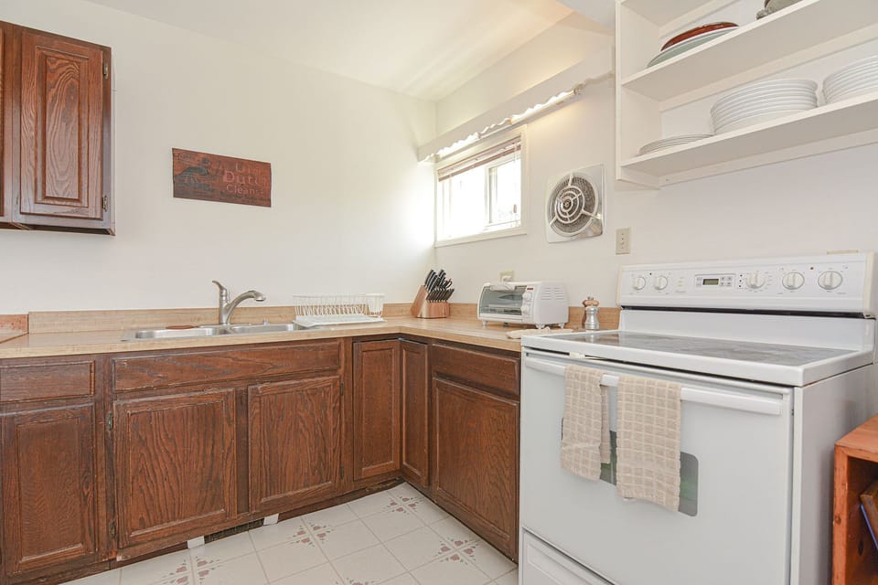 The kitchen is well-equipped with the basics.