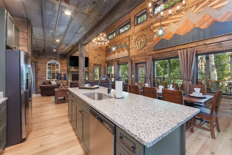 Open concept kitchen, dining, and living room.