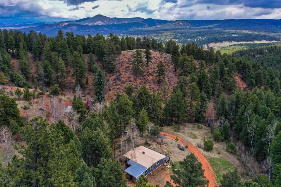 This cozy cabin offers a perfect getaway for those seeking a peaceful escape.