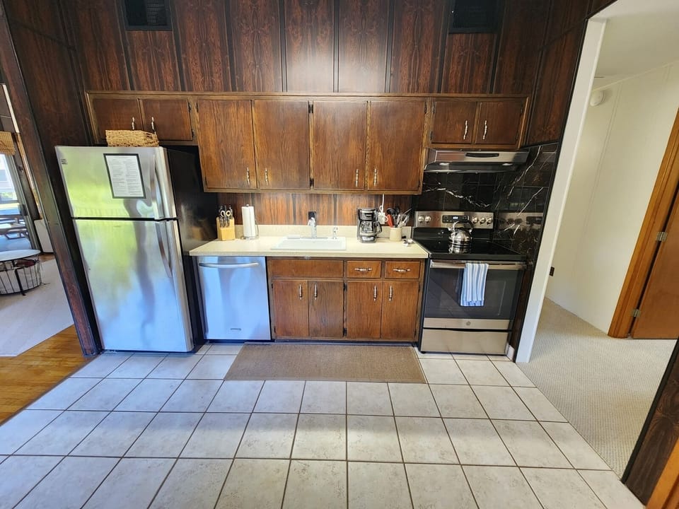 Bright and open kitchen with all the essentials for cooking, dining, and entertaining.