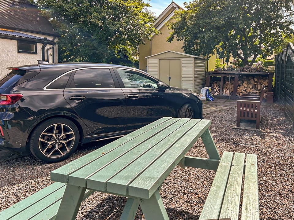 Parking and outside sitting area | Broom Cottage, Newtonmore