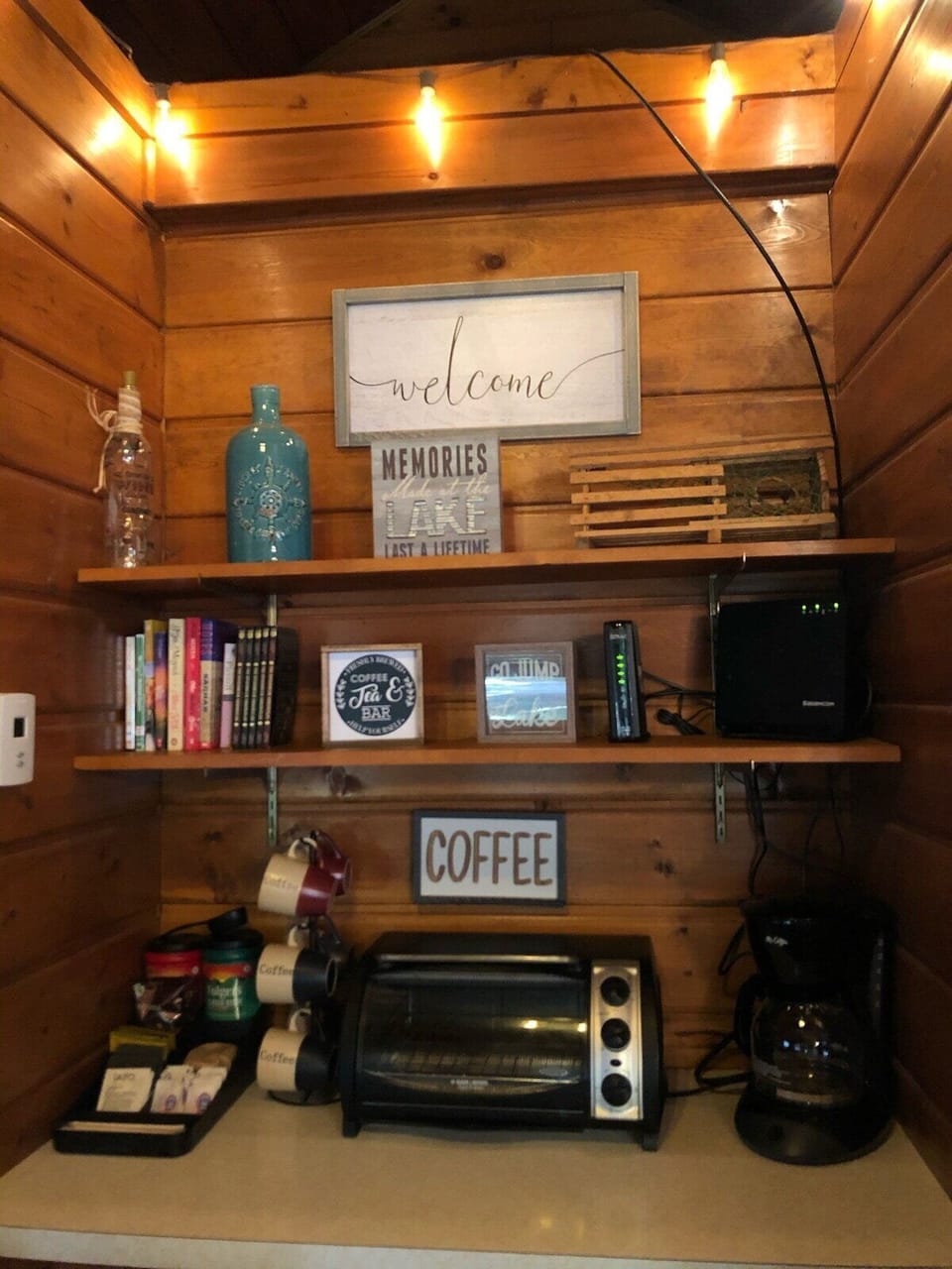 Complimentary WiFi, coffee and tea bar. Childrens games fill the cabinet below