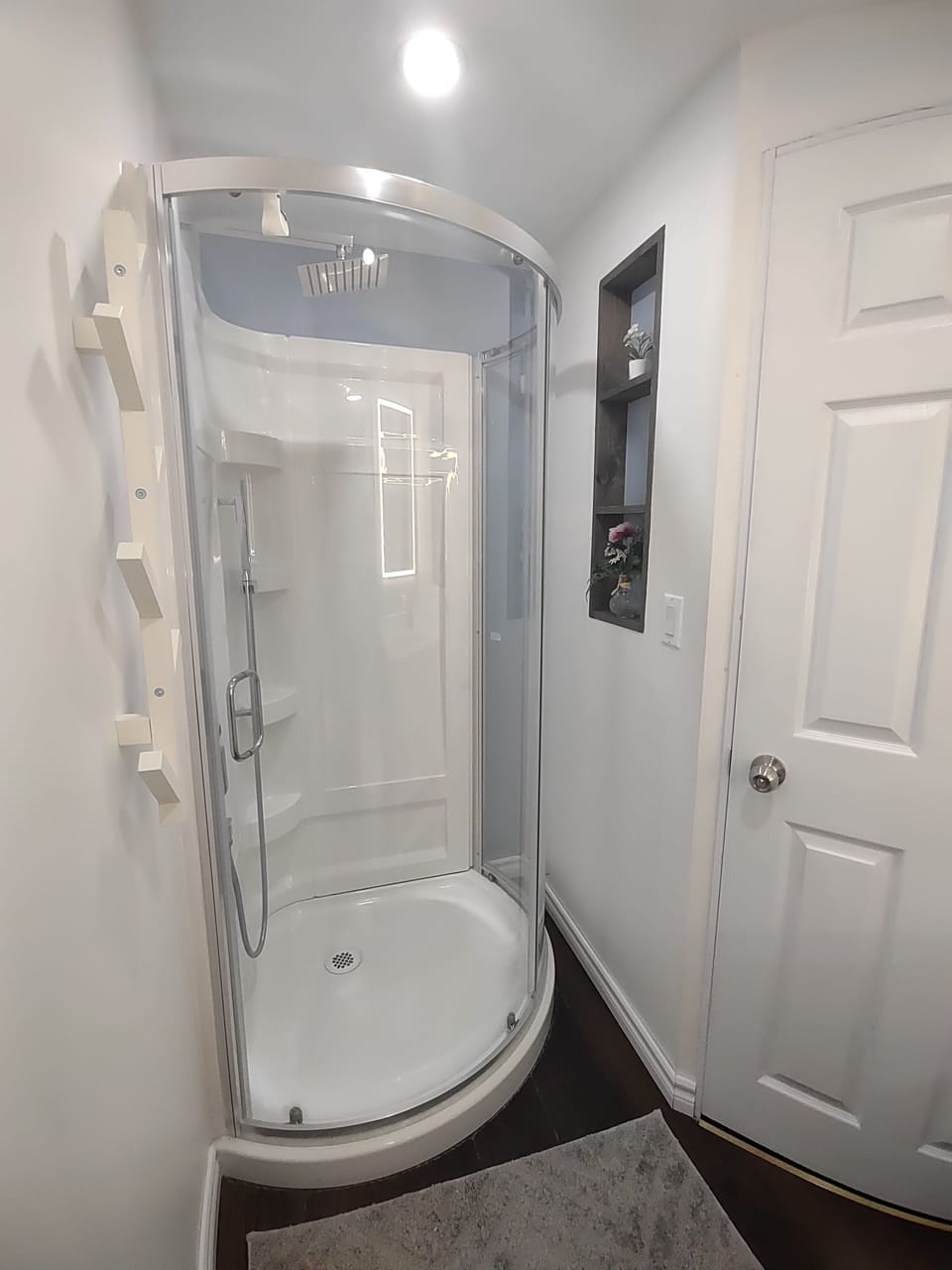 Stand shower in the second bath in side mater bedroom.