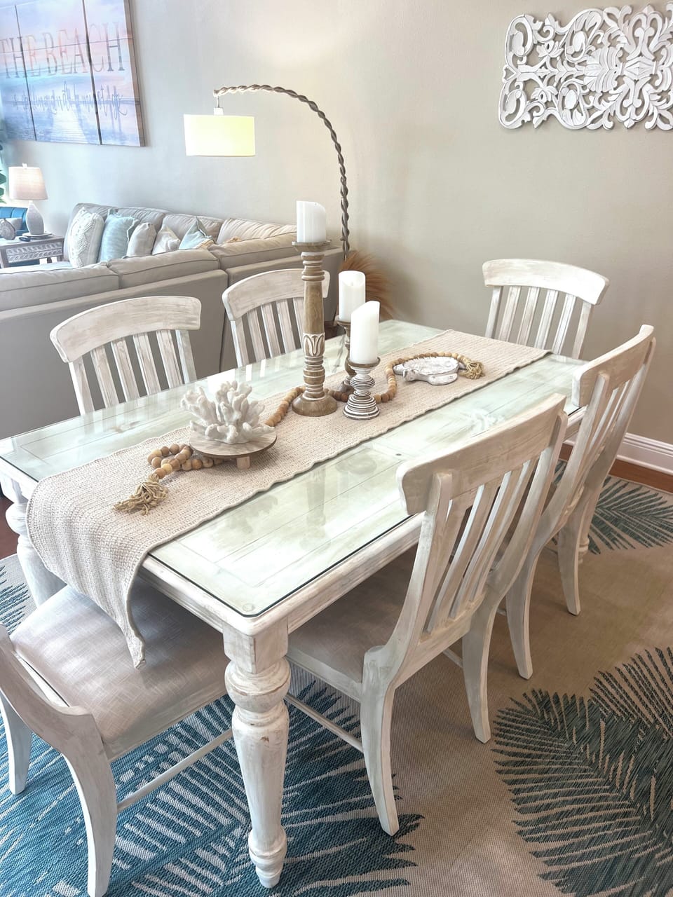 Room around this table for 6 guests with seating for 7 at the kitchen bar.  