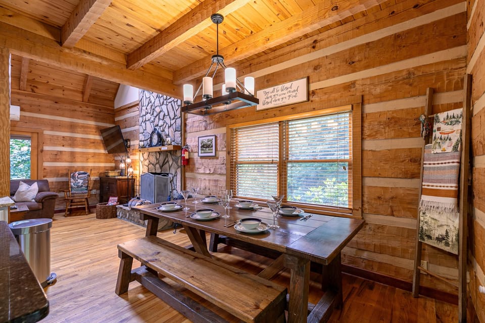 Main Level- Kitchen dining table seats 8 with additional 4 seats at the bar