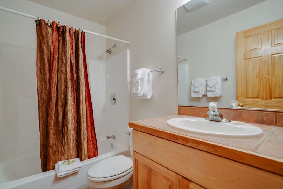 Second bathroom with shower-tub combo