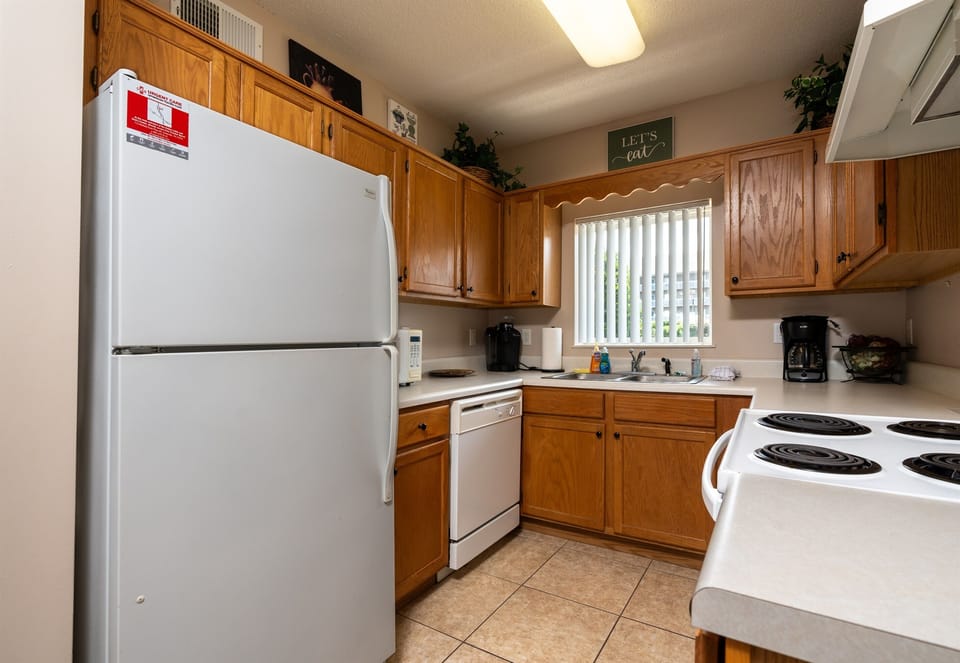 Kitchen with pots, pans, and dishware