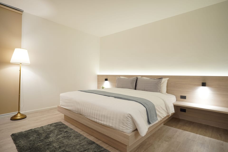 Deluxe Studio with Double Bed (No Window) | Free minibar items, desk, free WiFi, bed sheets