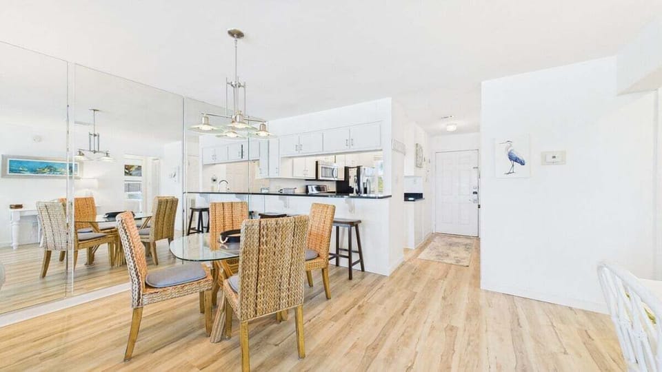 Dining area with table and breakfast bar