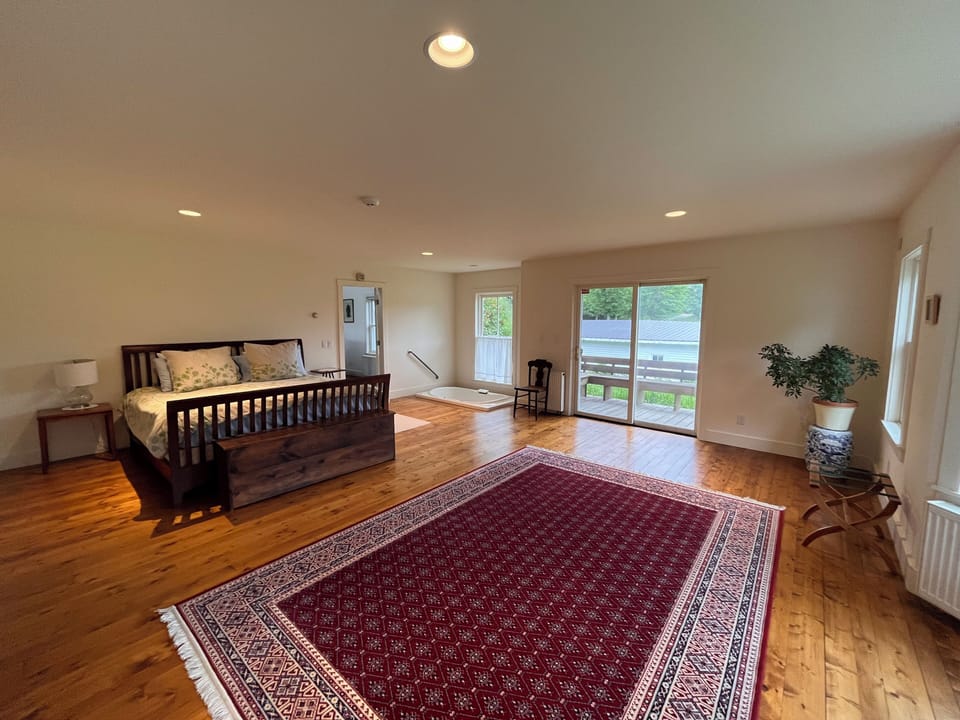 Main bedroom on 1st floor with attached private balcony and large jacuzzi