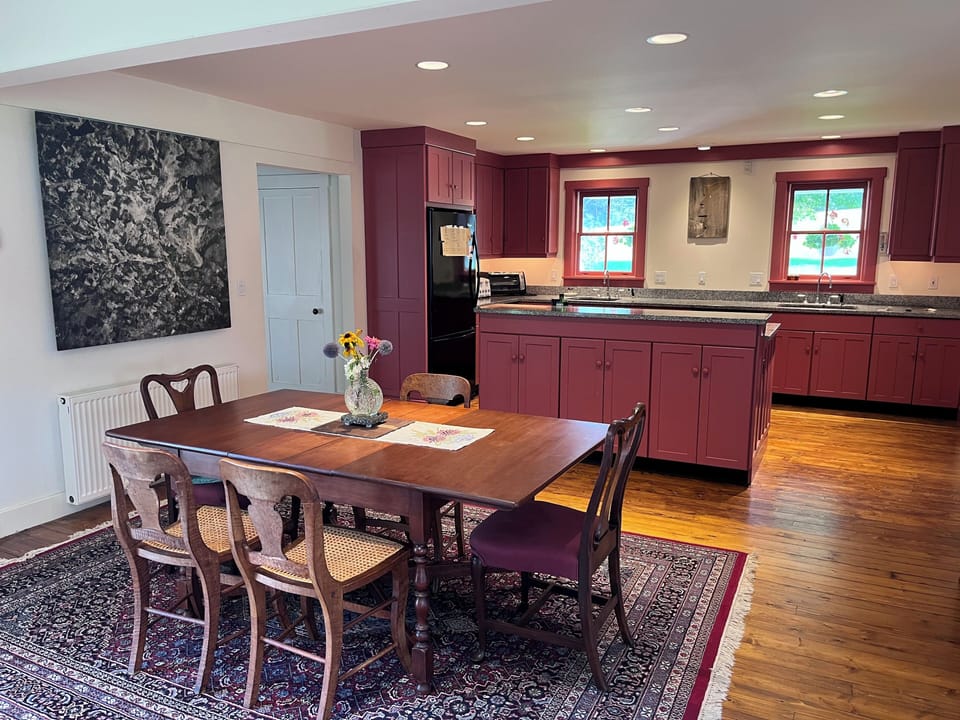 Spacious dining area connected to kitchen and large living space