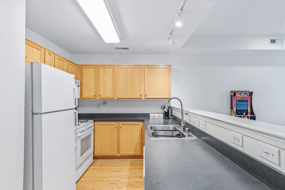 Kitchen is stocked with everything you need to cook and eat meals togther.