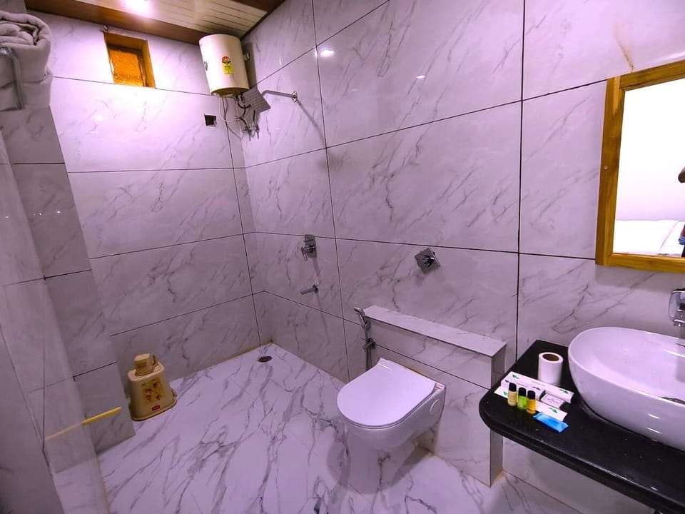 Family Quadruple Room, Multiple Beds | Bathroom | Designer toiletries, hair dryer, bathrobes, bidet